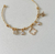 Bracelete charms trevo na internet