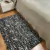ALFOMBRA SUKA - BLANCO Y NEGRO (80 X 120)