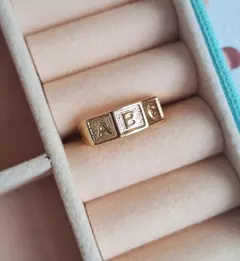 Anel ABC Cubo Dourado na internet