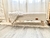 Pie de cama con funda de tusor