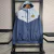 JAQUETA CORTA VENTO CHELSEA FC 23/24 NIKE-MASCULINA-AZUL