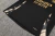 CONJUNTO REAL MADRID TREINO CAMISA SEM MANGA PRETO E SHORT PRETO 23/24