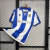 CAMISA REAL SOCIEDAD HOME 24/25 TORCEDOR-MACRON-MASCULINA-AZUL/BRANCA - comprar online