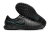 Chuteira Society Nike Tiempo Legend 10 Academy TF na cor preta, com detalhes em azul e solado projetado para gramados sintéticos.
