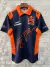 Image of CAMISA POLO F1 RED BULL 2023-MASCULINO-AZUL/LARANJA