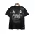 Camisa preta do Real Madrid da edição especial 24/25, com detalhes em dragão e logotipo da Adidas.
