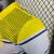 Imagem do CAMISA POLO AL-NASSR FC 23/24 TORCEDOR-DUNEUS-MASCULINA-AMARELO/BRANCA/AZUL