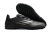 Chuteira Futsal Adidas F50 CLUB TF com design preto e detalhes em dourado, mostrando a sola em borracha.
