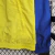 JAQUETA CORTA VENTO REVERSIBLE AL-NASSR FC 23/24 -DUNEUS -MASCULINA-AMARELO/CREME