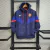 JAQUETA CORTA VENTO BARCELONA 23/24 NIKE-MASCULINA-AZUL/AMARELO (cópia)