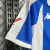 CAMISA DEPORTICO DE LA CORUÑA 23/24 TORCEDOR-KAPPA-MASCULINA-BRANCO/AZUL