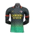 Camisa do AC Milan Co-Branded 25/26, modelo jogador, masculina, com detalhes em verde e preto e logo da Puma.