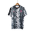 Camisa de treinamento masculina da Juventus, modelo 23/24, nas cores branca e preta, com detalhes em rosa e logo da Adidas.