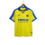 Camisa amarela do Villarreal CF, comemorativa do 100º aniversário, com detalhes em azul e logo do clube.