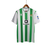 Camisa oficial do Real Betis, modelo home 23/24, nas cores verde e branca, com listras verticais e logotipo da Hummel.