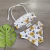 Bikini Flor Amarilla Niña Kids - comprar online