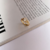 ANEL SOLITARIO CRAVEJADO BANHADO A OURO 18K na internet