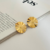 BRINCO ORGANICO CIRCULAR BANHADO A OURO 18K - CRAVOBIJU