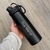 Garrafa preta inox com tampa e alça - comprar online