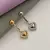 Piercing Umbigo Duplo Coração Cravejado - comprar online