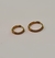 Argola Aço Cirúrgico PVD Gold 24K Zircônias em um das laterais