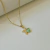 Conjunto Dorado Estrella de Mar con Caracola Cubic