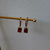 Argolla Trabajada Dorada Nalu Cubic Roja