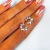 Aro mini Floral Piedra Strass Acero Común