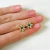 Aro Mini Dorado Florcita con Strass