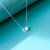 Conjunto plateado doble corazón cubic