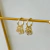 Argolla Dorada Triple Gota Blanco Cubic