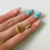 Aro dorado Alice cubic - comprar online