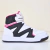 Tênis infantil Via Vip cano médio nas cores branco, preto e detalhes em rosa.
