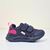 Tênis Klin infantil feminino em rosa e azul marinho, modelo com fecho em velcro.
