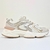 Tênis Ramarim Sneaker na cor areia com detalhes em branco e rosa, ideal para uso casual feminino.