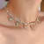 Collar mariposa con strass