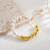 Pulsera mixta perlada - Cobre chapado en oro - Merlina Tiendita