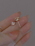 Aros Corazón - Cobre con Aguja de Plata 925 - Merlina Tiendita