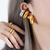 Ear Cuff Aurora - Acero chapado en oro - comprar online