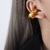 Ear Cuff Aurora - Acero chapado en oro