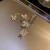 Image of Clip de oreja Butterfly con strass
