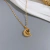 Imagen de Collar de proyección - Acero de Titanio - Luna dorada