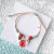 Pulsera con flor encapsulada - Merlina Tiendita