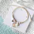 Pulsera con flor encapsulada - tienda online
