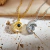 Collar de proyección - Acero de Titanio - Luna dorada - comprar online