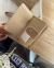 Billetera Cupido beige en internet