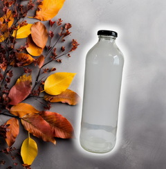 botella de jugo de 910cc con tapa de metal o corcho