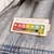 Broche Interativo - Bateria Social - Luna Solarium