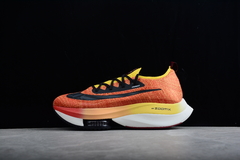 Air Zoom Tempo Next "Red Yellow Colorful" na internet