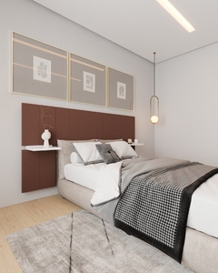 Quarto moderno com cabeceira estofada marrom e bancada, cama com almofadas e cobertor, tapete e quadros decorativos na parede.